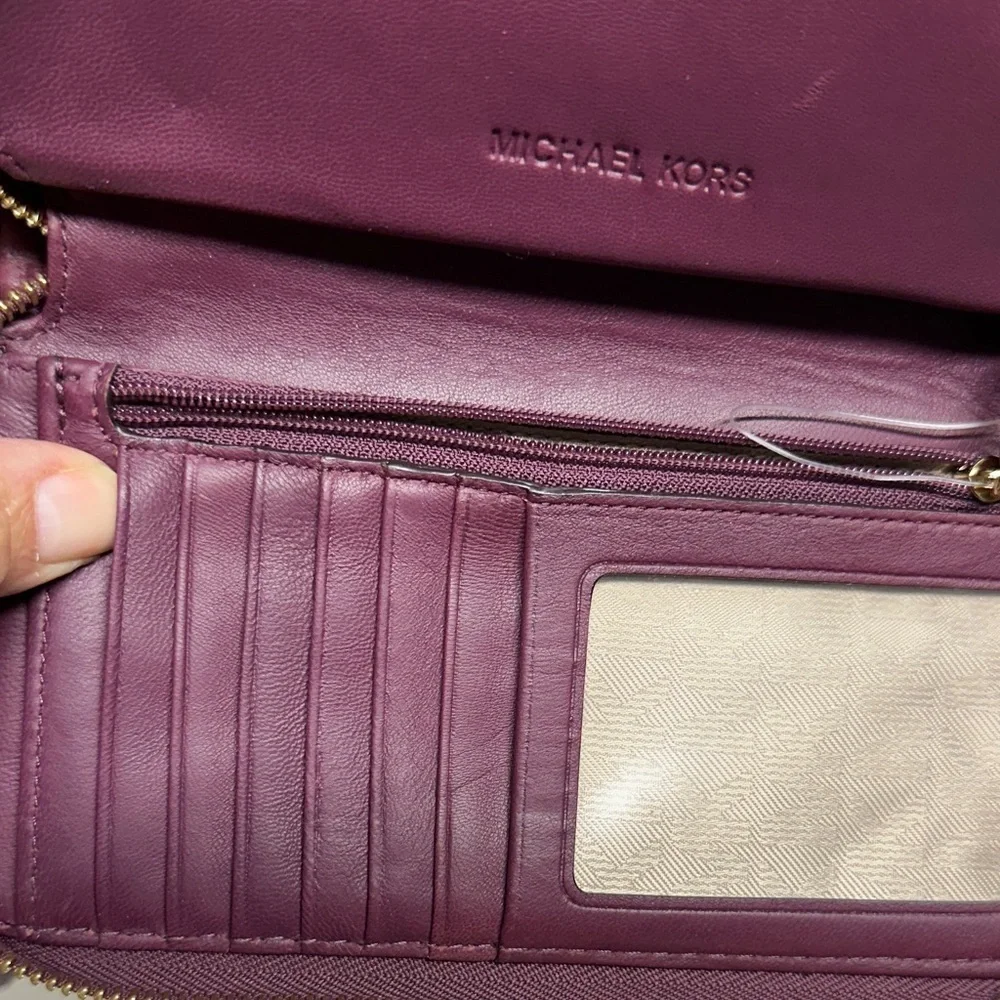 Michael Kors Plum Quilted Wristlet/ wallet